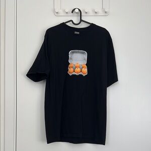 Stussy Black Tee with Orange Graphic